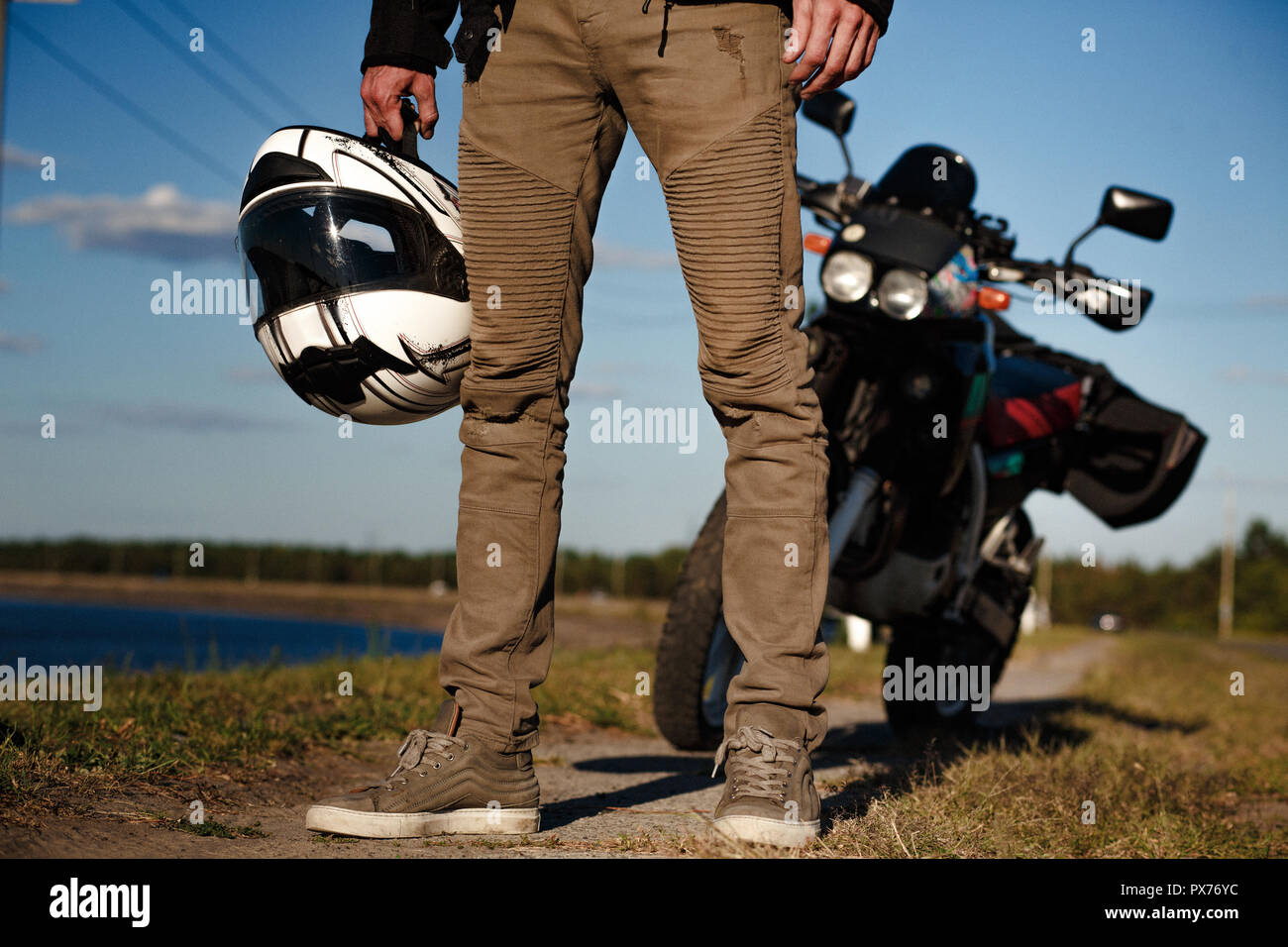 Close view on biker's legs from the front Stock Photo