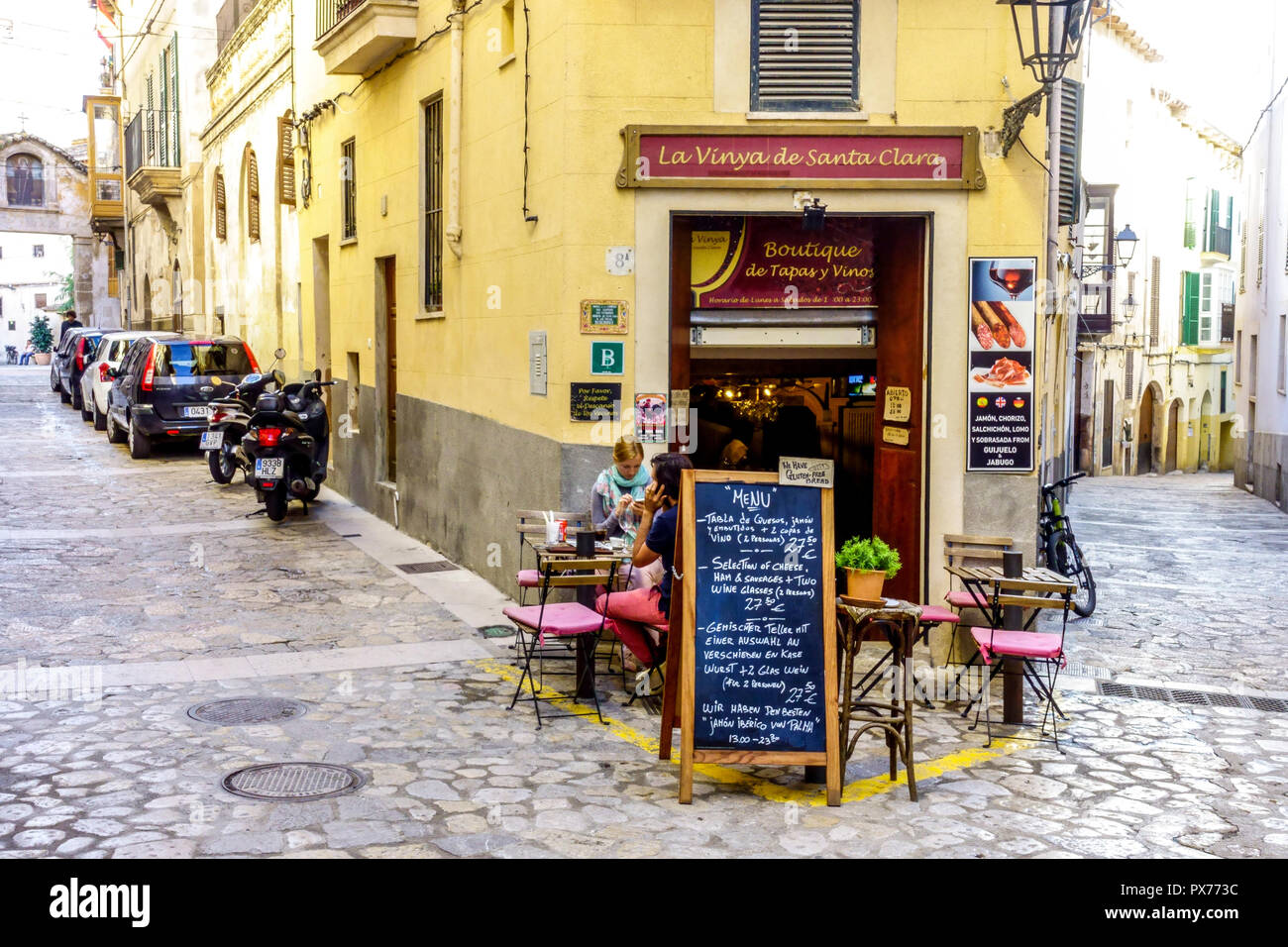 Palma de Mallorca street cafe, sidewalk corner bar in Palma Old Town, Spain Stock Photo