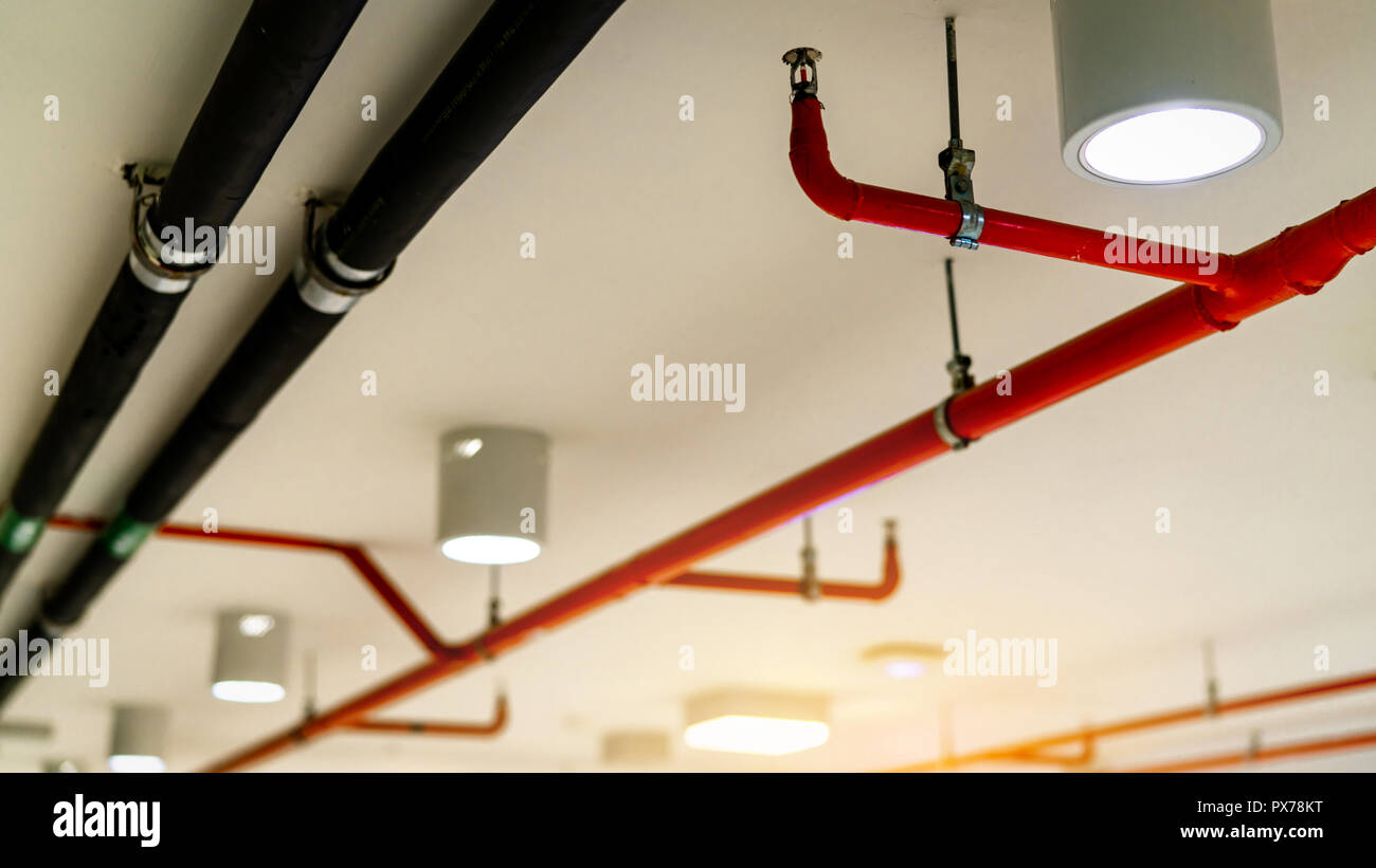 Automatic fire sprinkler safety system and black water cooling supply pipe. Fire  Suppression. Fire protection and detector. Fire sprinkler system with Stock  Photo - Alamy
