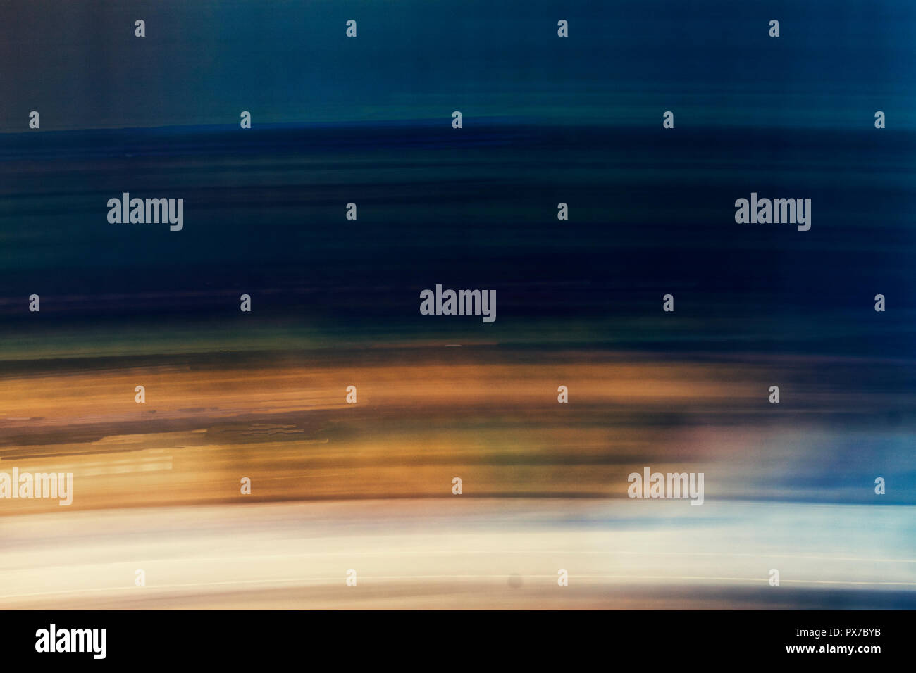 abstract background. digital image of colored lights and tracks moving fast on a gray background Stock Photo