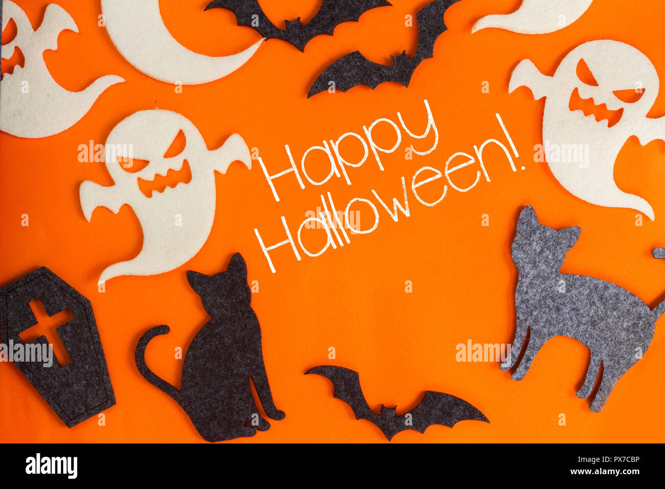 Halloween scene on orange background Stock Photo - Alamy