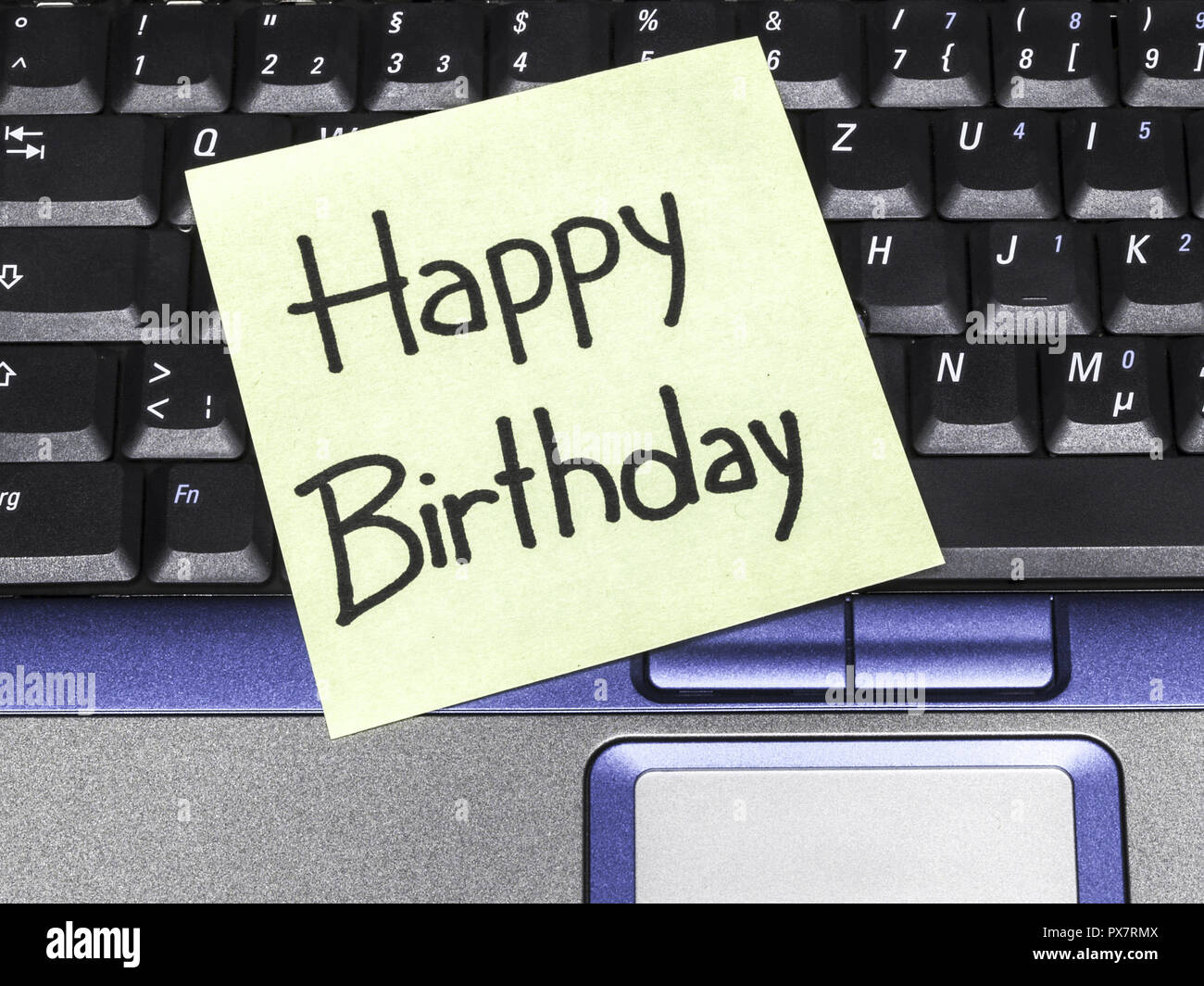 Memo note on notebook, Happy Birthday Stock Photo - Alamy