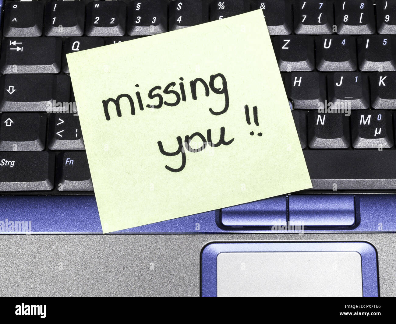 Memo note on notebook, missing you Stock Photo - Alamy