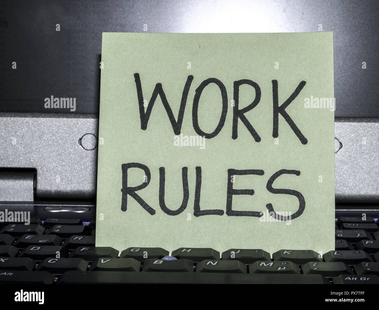 Memo note on notebook, work rules Stock Photo Alamy