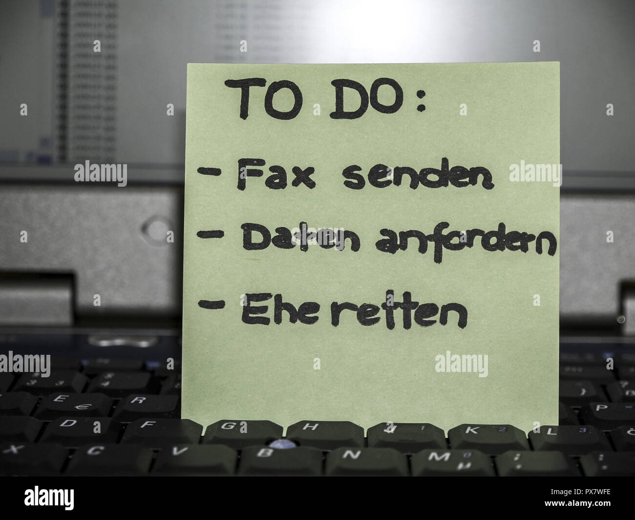 Memo note on notebook, to do send fax, get data, save marriage Stock Photo