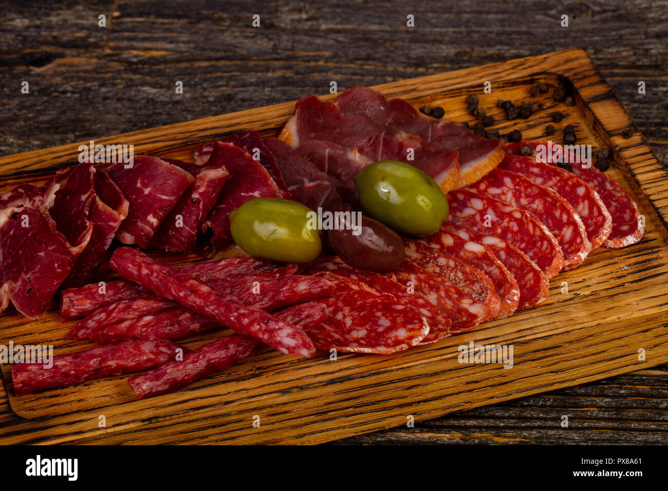 Italian meat plate mix assortment Stock Photo - Alamy