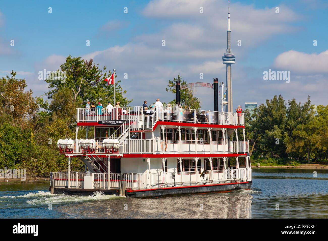 TORONTO, CANADA - SEPTEMBER 19, 2018: The beautiful Toronto Islands, and touristic boat. The islands are a popular recreational destination. Toronto,  Stock Photo