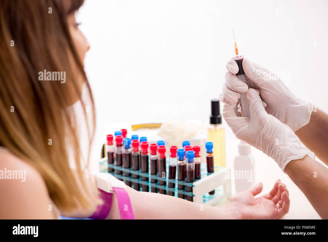 Young patient during blood test sampling procedure Stock Photo - Alamy