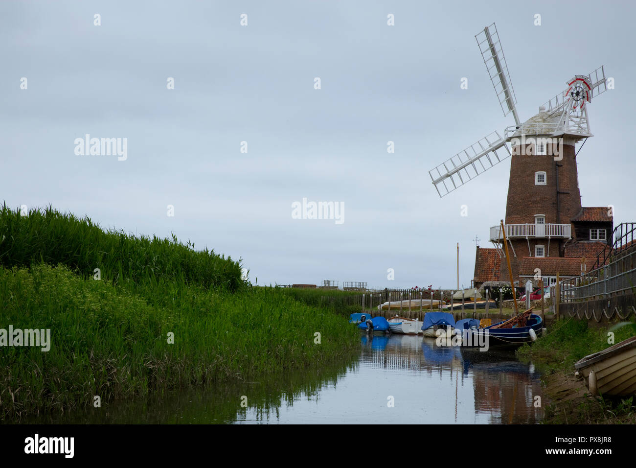 Cley windmill on the River Glaven at Cley Next The Sea, Norfolk, England Stock Photo