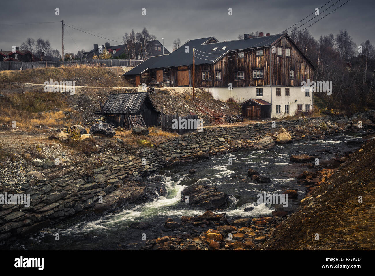 Mining town Røros in Norway, fantastic original old norwegian town, set as a UNESCO World Heritage Site. Traditional wooden architecture. Stock Photo