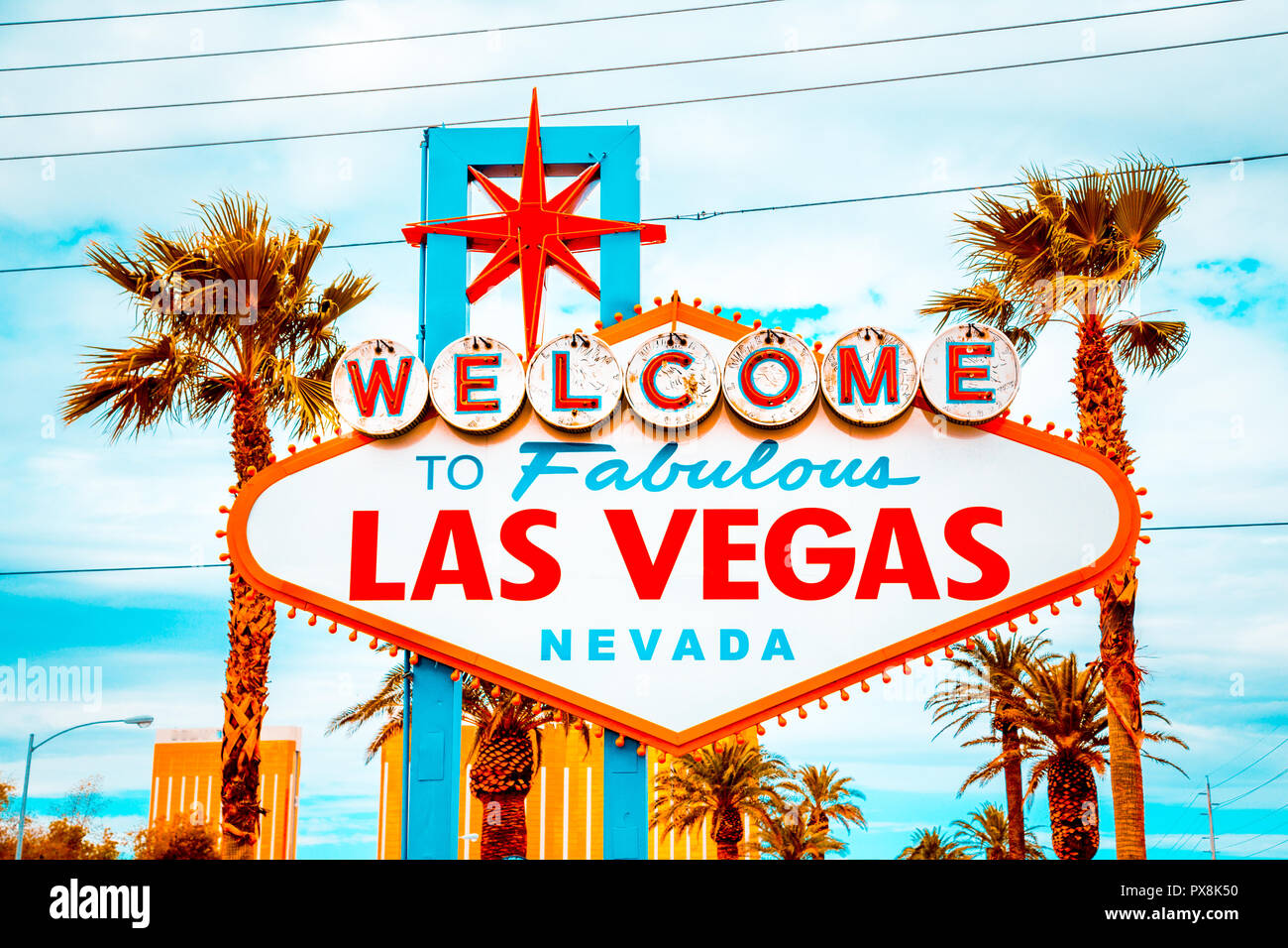 Classic view of Welcome to Fabulous Las Vegas sign at the south end of world famous Las Vegas strip on a beautiful sunny day with blue sky and clouds, Stock Photo