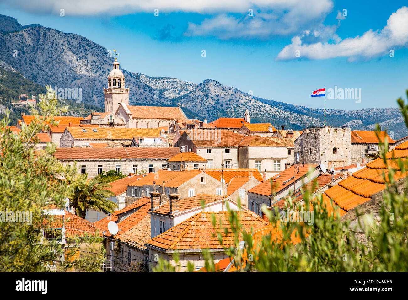 Beautiful view of the historic town of Korcula on a beautiful sunny day with blue sky and clouds in summer, Island of Korcula, Dalmatia, Croatia Stock Photo