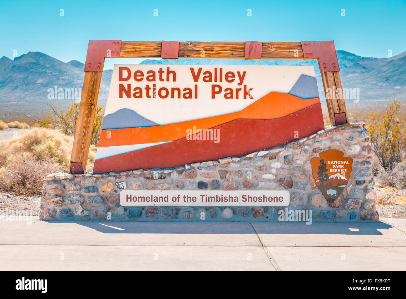 Classic view of famous Death Valley National Park entrance sign on a sunny day with blue sky in summer, California, USA Stock Photo