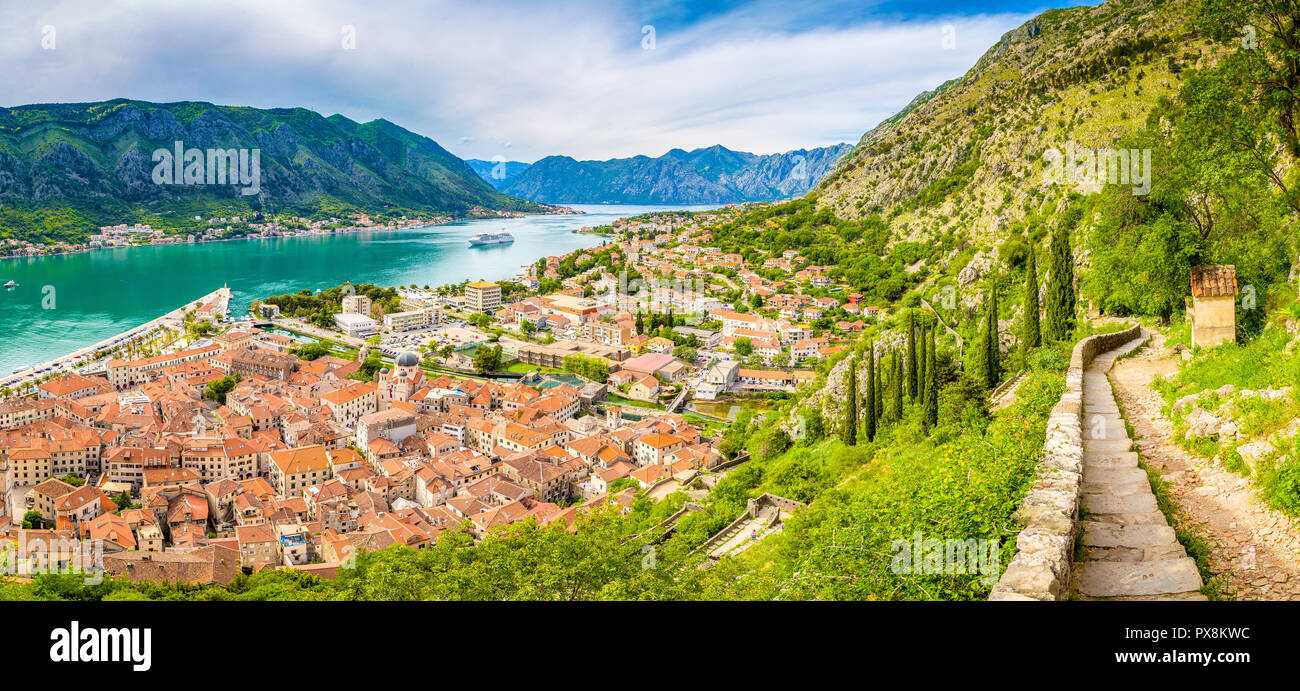 Scenic panoramic view of the historic town of Kotor with famous Bay of Kotor on a beautiful sunny day with blue sky and clouds, Montenegro, Balkans Stock Photo