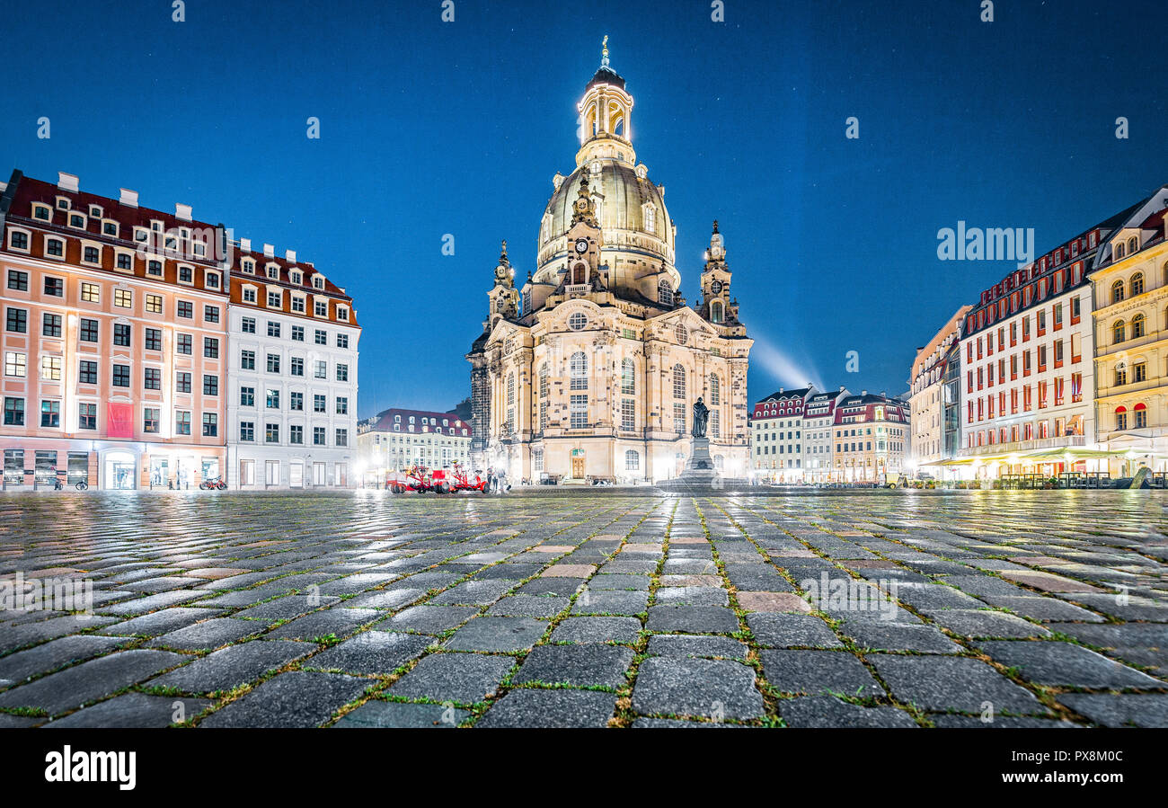 Twilight view of famous Dresdner Frauenkirche illuminated in beautiful evening twilight with dramatic sky during blue hour at dusk, Dresden, Saxony, G Stock Photo