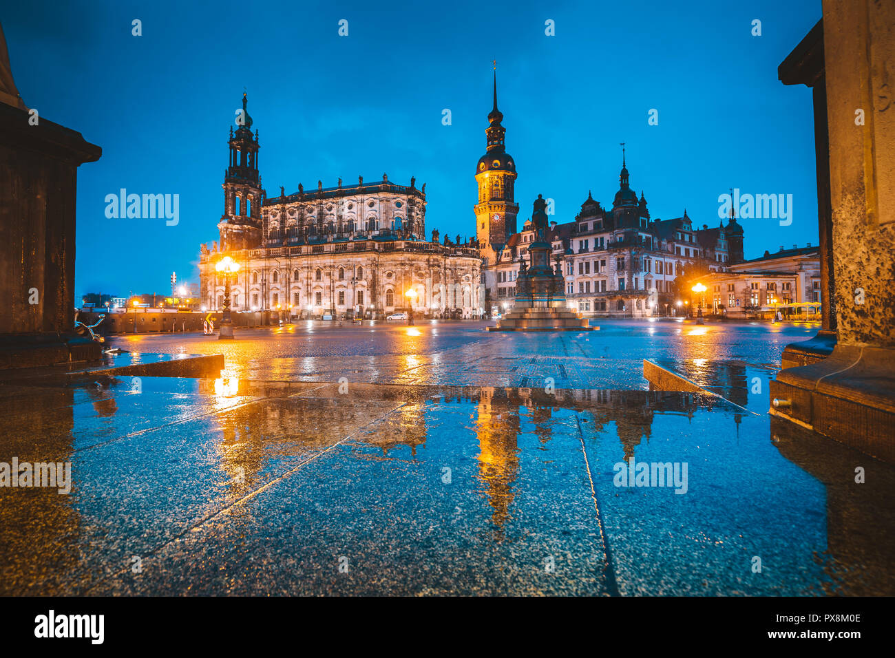 Classic twilight view of historic Dresden city center illuminated in beautiful evening twilight with dramatic sky during blue hour at dusk, Saxony, Ge Stock Photo