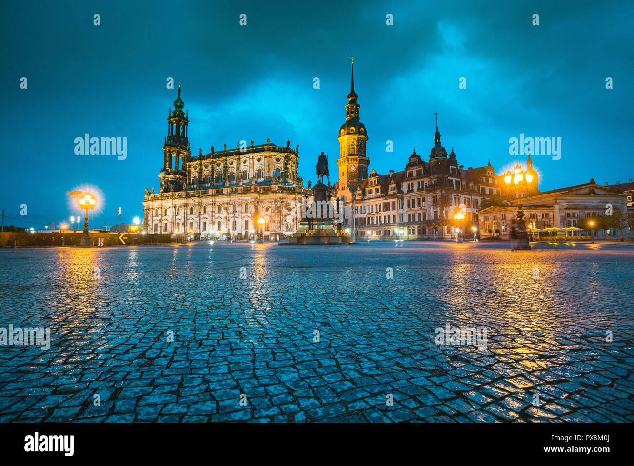 Classic twilight view of historic Dresden city center illuminated in beautiful evening twilight with dramatic sky during blue hour at dusk, Saxony, Ge Stock Photo