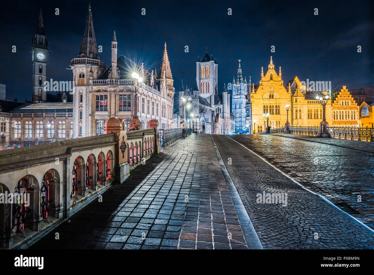 Panoramic view of the historic city center of Ghent illuminated in beautiful post sunset twilight during blue hour at dusk, Ghent, East Flanders, Belg Stock Photo