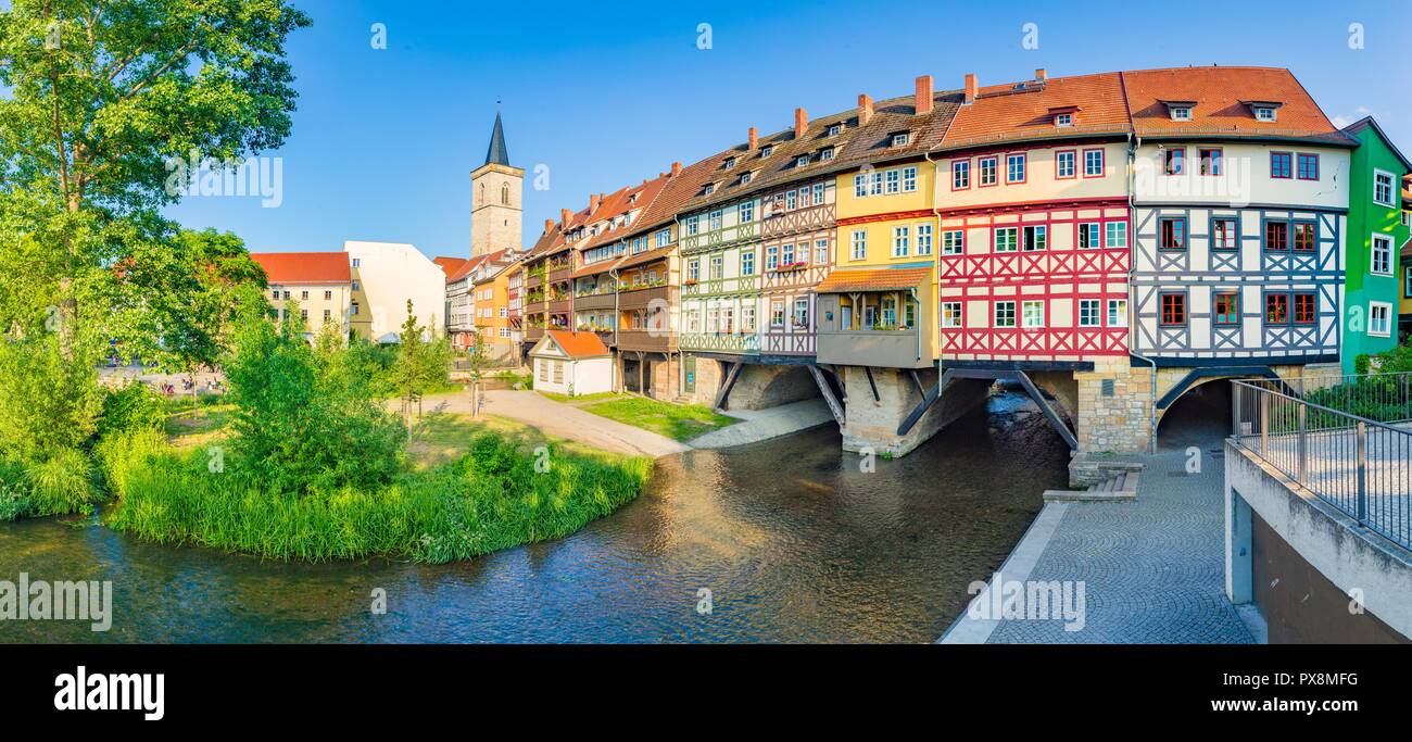 Classic panoramic view of the historic city center of Erfurt with famous Krämerbrücke bridge illuminated at at sunset. Thüringen, Germany Stock Photo