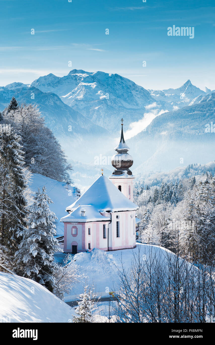 Beautiful winter wonderland mountain scenery in the Alps with pilgrimage church of Maria Gern, Berchtesgadener Land, Bavaria, Germany Stock Photo