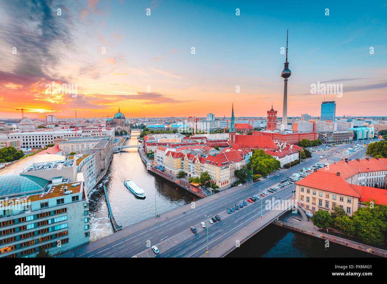 Classic view of Berlin skyline with famous TV tower and Spree in beautiful golden evening light at sunset, central Berlin Mitte, Germany Stock Photo