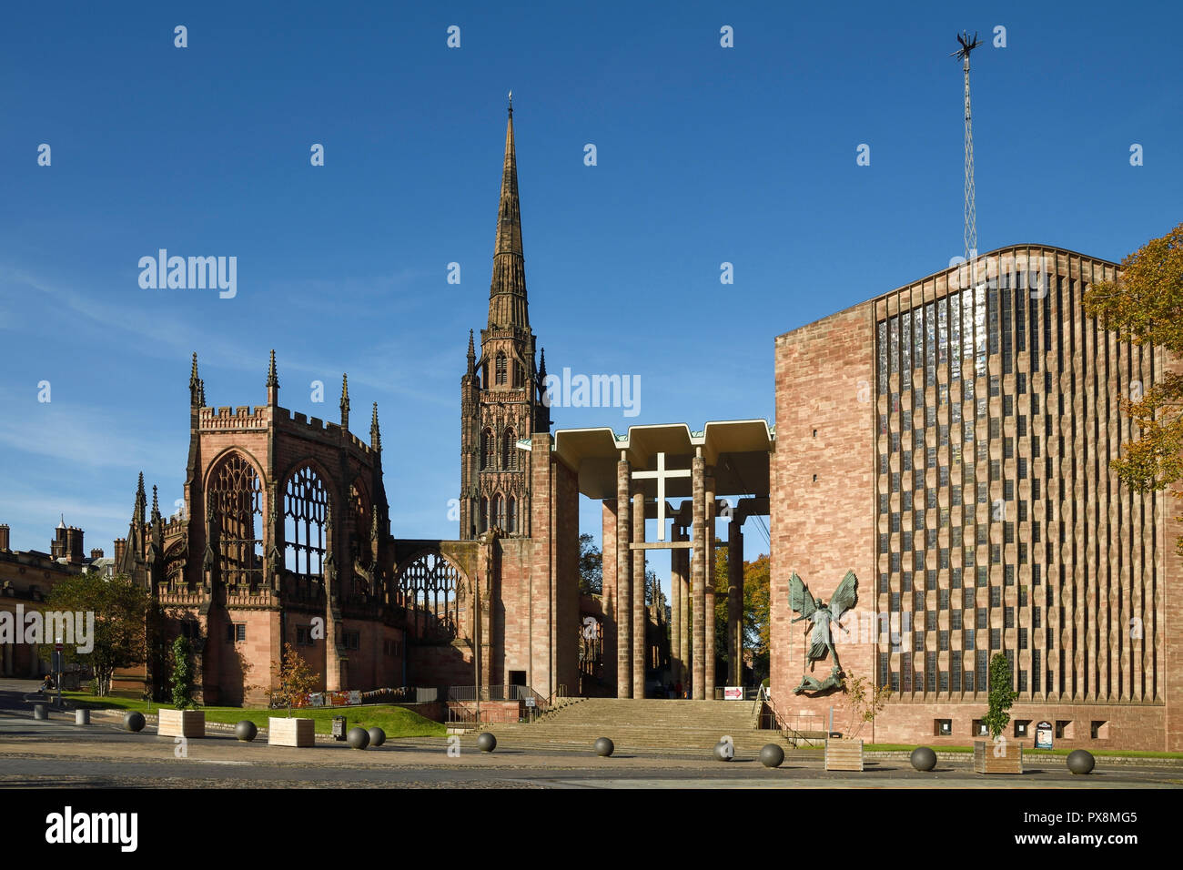 The old ruins and new Coventry Cathedral viewed from University Square on Priory Street in Coventry city centre UK Stock Photo