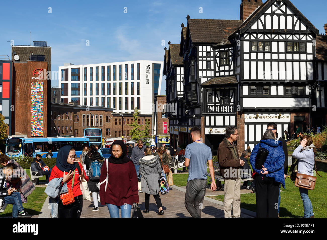 Pedestrians on Trinity Street in Coventry city centre UK Stock Photo