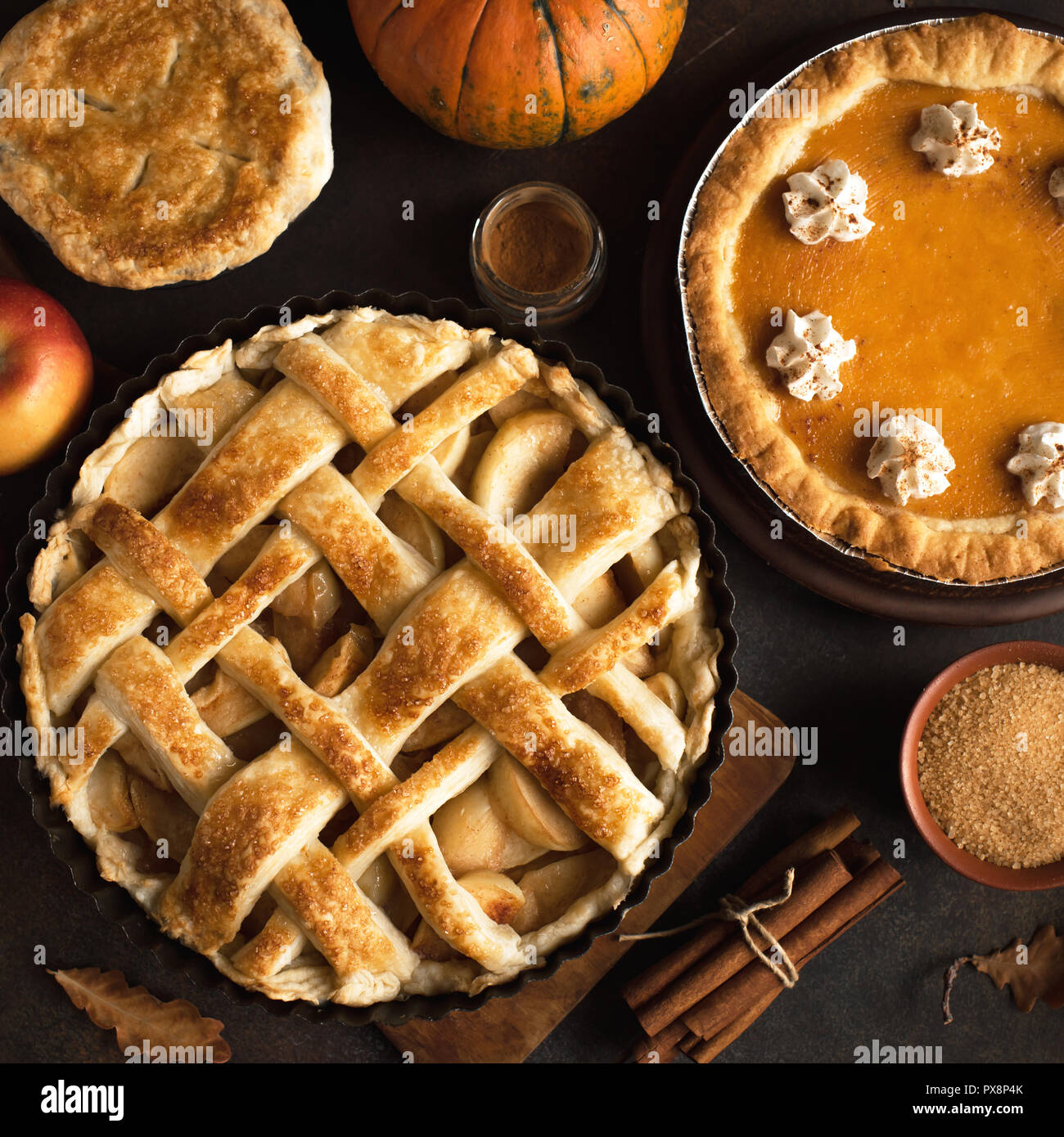 Thanksgiving pumpkin and apple various pies, top view. Fall traditional ...