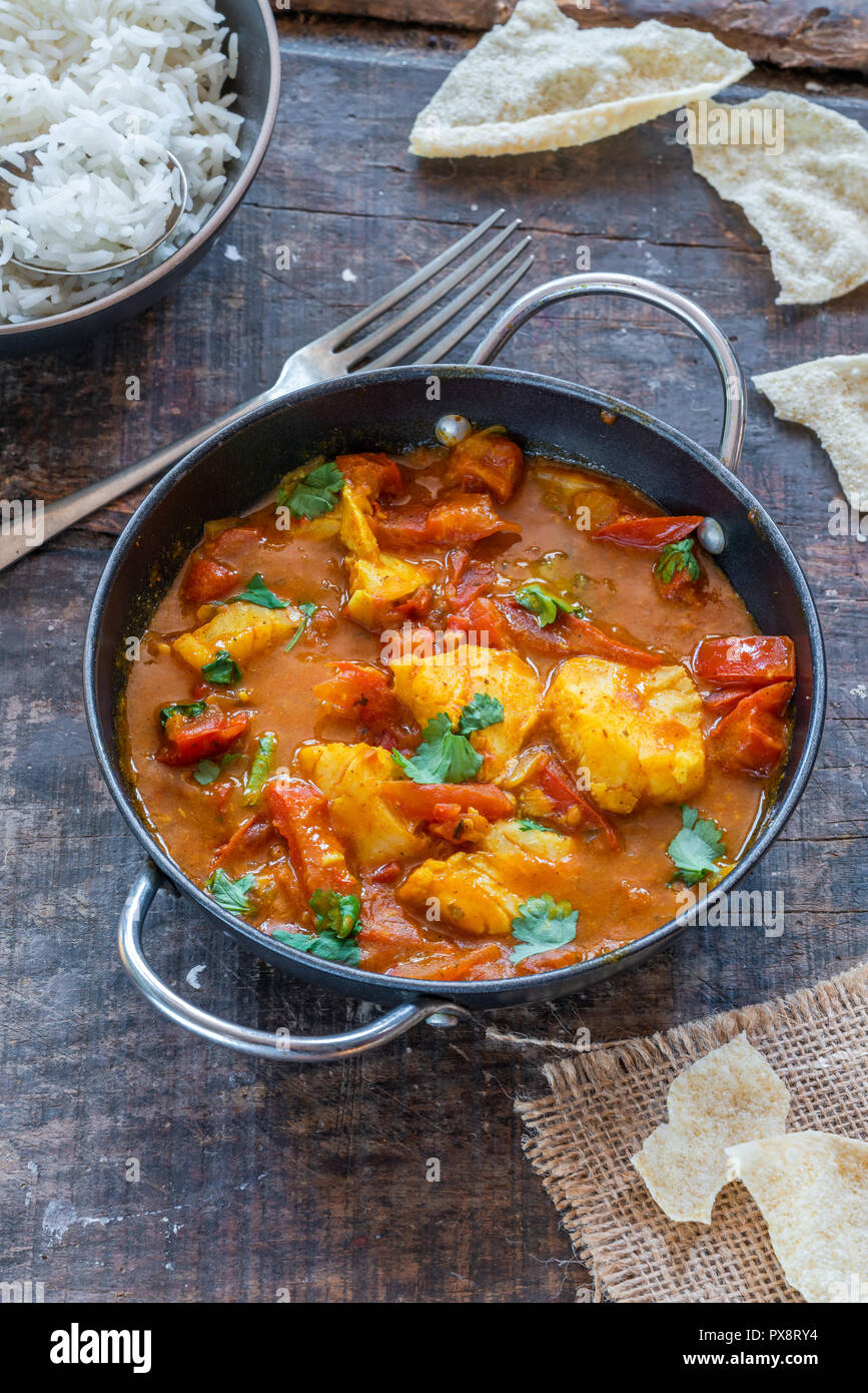 Fish Mappas Keralan style coconut fish curry with rice. It's a