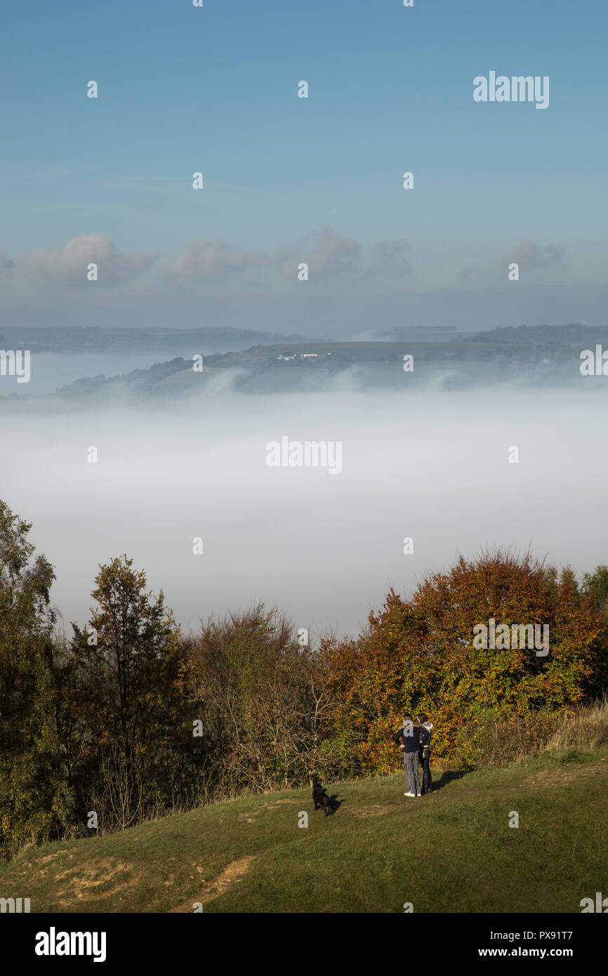 Bath, UK. 20th October 2018. Thick fog lingers in the valley around the city of Bath - a phenomenon known as a 'cloud inversion' takes place when ground temperatures are cooler than the air above, effectively trapping moisture and vapour like a 'bath' in the low lying areas of land. Credit: Wayne Farrell/Alamy Live News Stock Photo