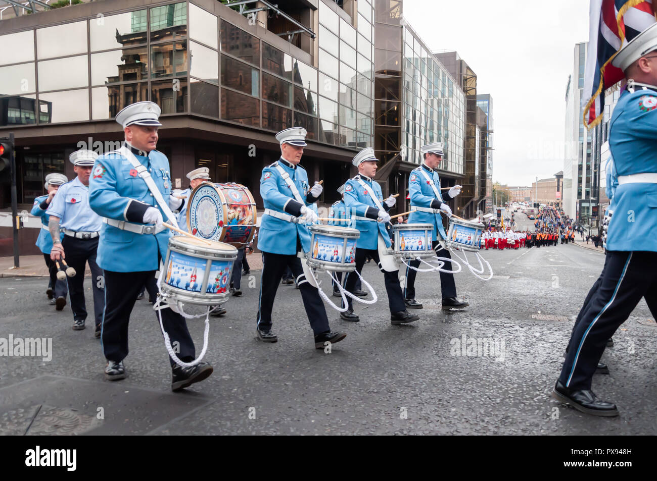 Glasgow, Scotland, UK. 20th October, 2018. Marchers taking part in the End of the Great War Centenary Memorial Parade through the streets of the city from Kelvingrove Park to Glasgow Green, organised by 36th (Ulster) Memorial Association. Credit: Skully/Alamy Live News Stock Photo