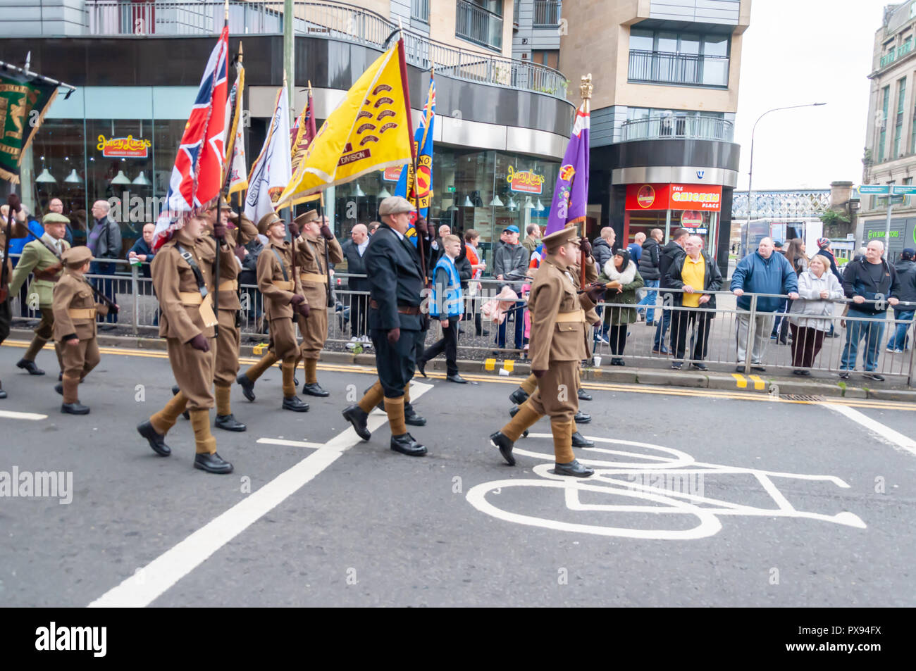 Glasgow, Scotland, UK. 20th October, 2018. Marchers taking part in the End of the Great War Centenary Memorial Parade through the streets of the city from Kelvingrove Park to Glasgow Green, organised by 36th (Ulster) Memorial Association. Credit: Skully/Alamy Live News Stock Photo