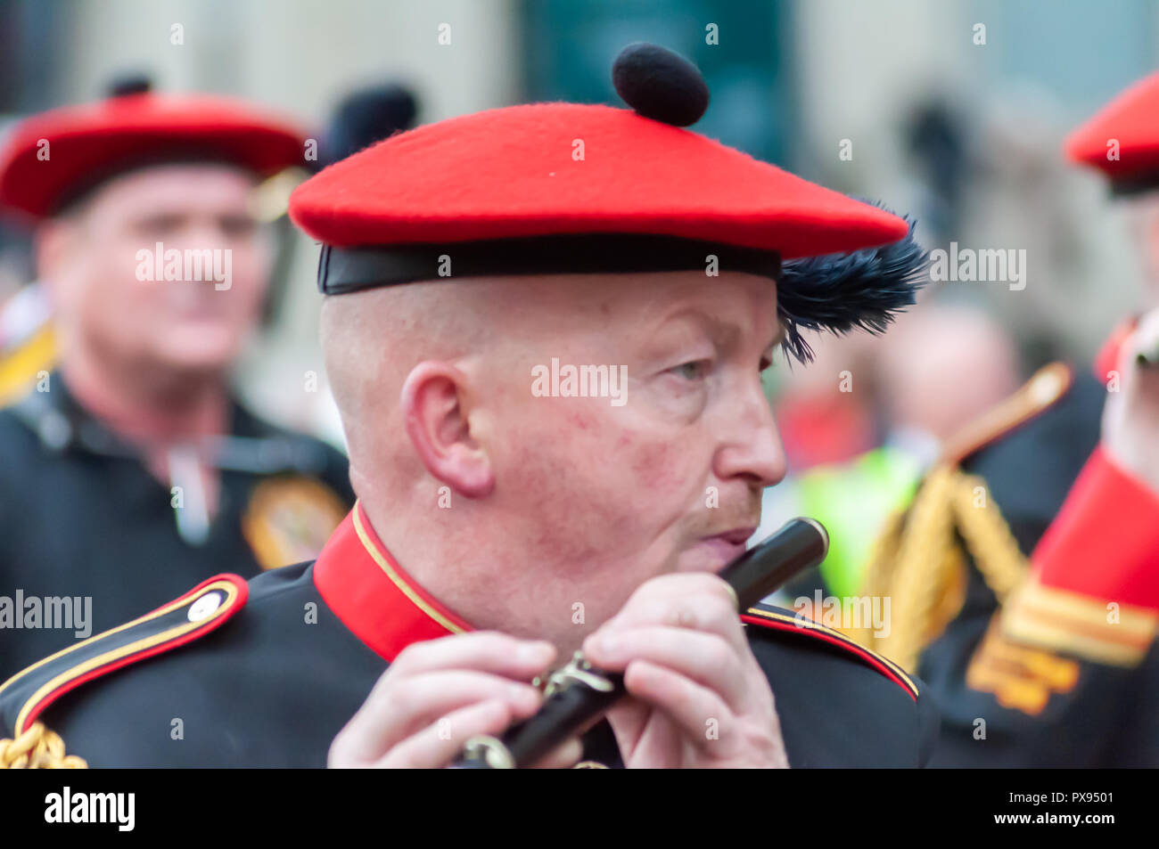 Glasgow, Scotland, UK. 20th October, 2018. Marchers taking part in the End of the Great War Centenary Memorial Parade through the streets of the city from Kelvingrove Park to Glasgow Green, organised by 36th (Ulster) Memorial Association. Credit: Skully/Alamy Live News Stock Photo