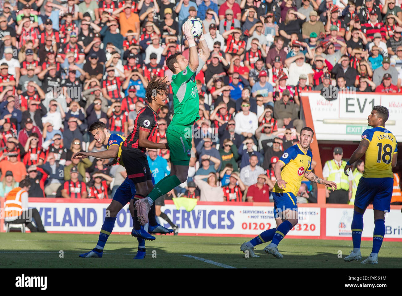 Alex McCarthy of Southampton leaps high to claim the ball during the Premier League match between AFC Bournemouth and Southampton at the Vitality Stadium, Bournemouth, England on 20 October 2018. Photo by Simon Carlton.  Editorial use only, license required for commercial use. No use in betting, games or a single club/league/player publications. Stock Photo