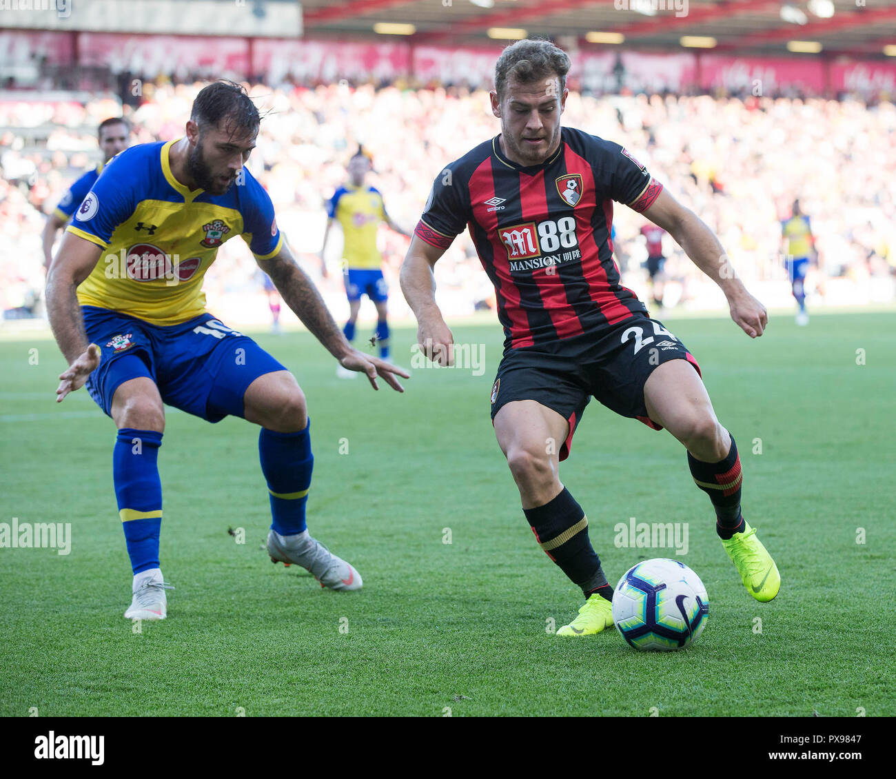 Ryan Fraser of Bournemouth  shields the ball from Charlie Austin of Southampton during the Premier League match between AFC Bournemouth and Southampton at the Vitality Stadium, Bournemouth, England on 20 October 2018. Photo by Simon Carlton.  Editorial use only, license required for commercial use. No use in betting, games or a single club/league/player publications. Stock Photo