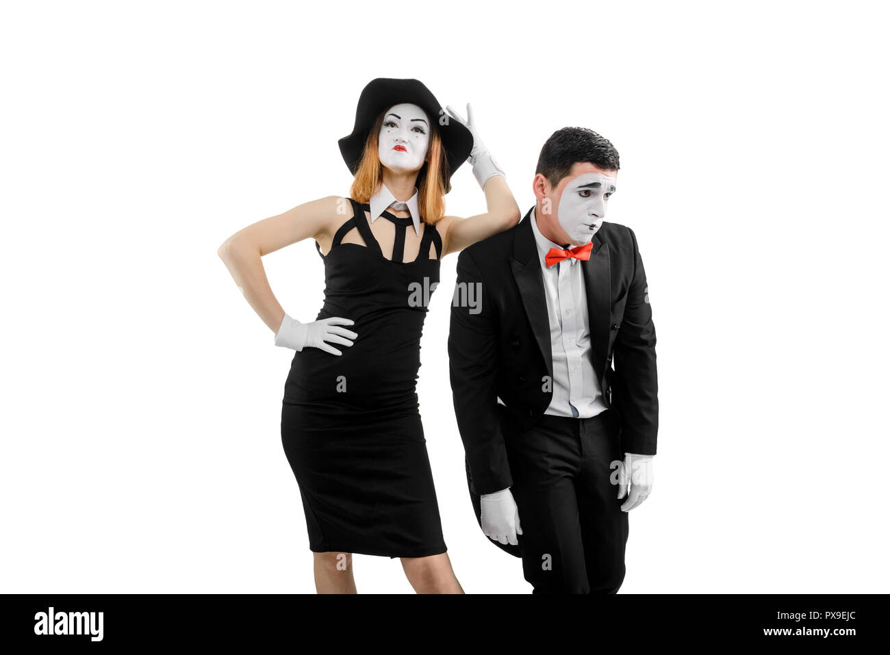 Arrogant woman and sad man Stock Photo