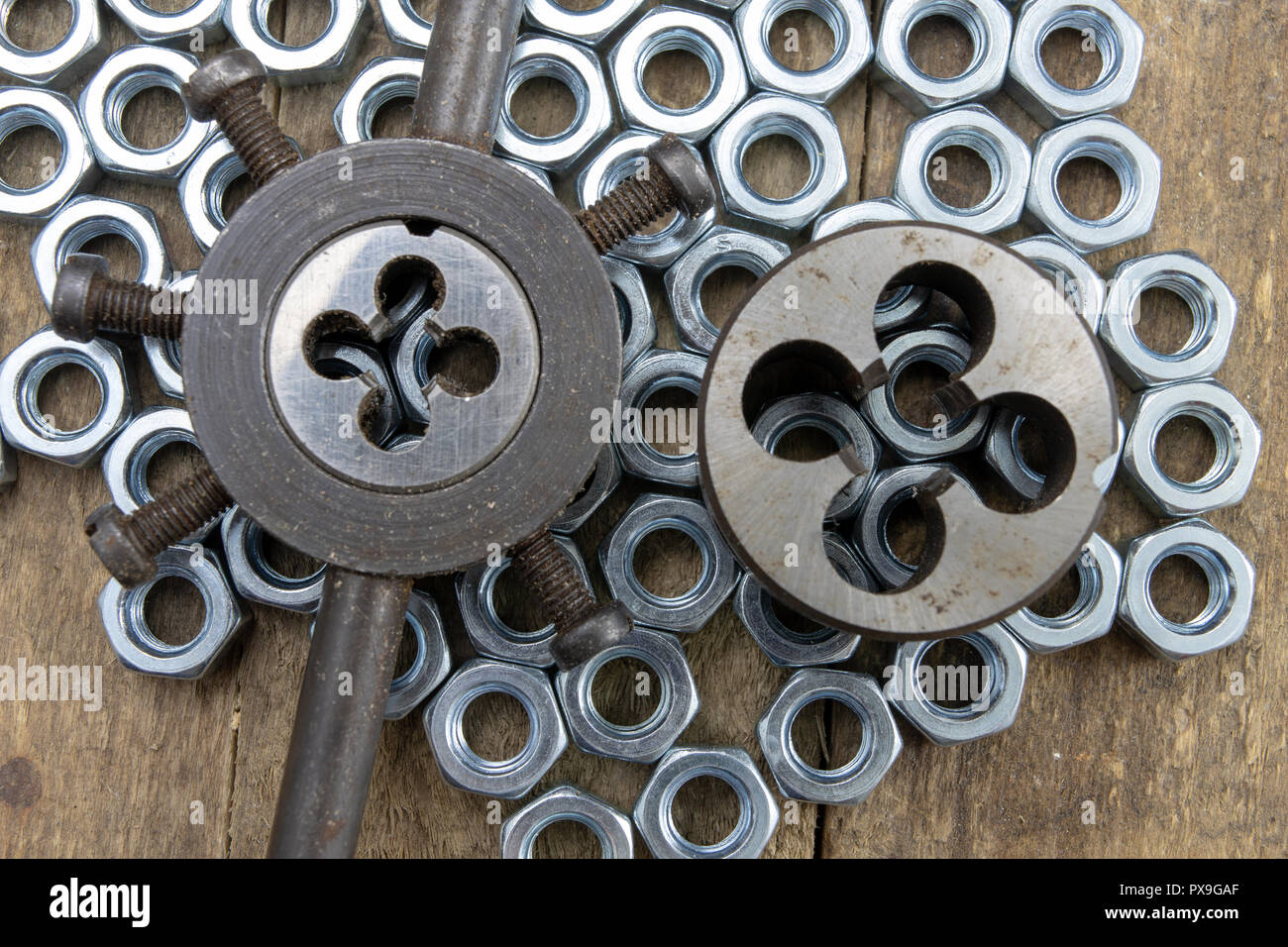 Dies and tap for thread cutting in locksmith works. Accessories for a ...