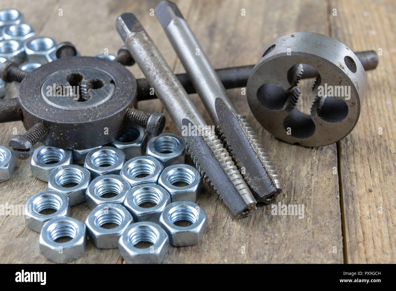 Dies and tap for thread cutting in locksmith works. Accessories for a ...