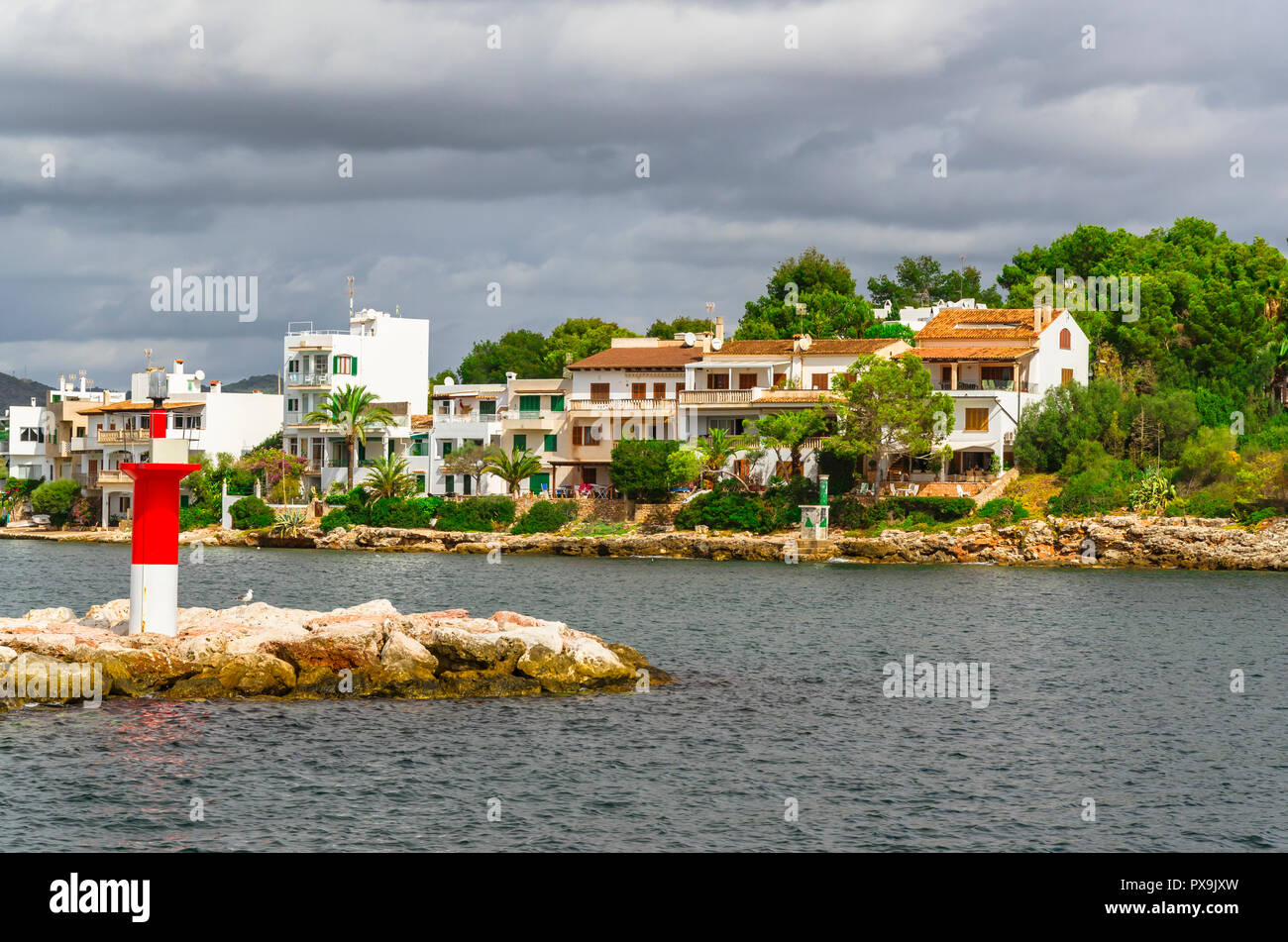 Houses at the harbour of Porto Petro. Stock Photo