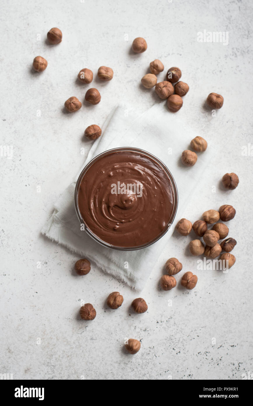 Chocolate Hazelnut Spread on white background, top view, copy space