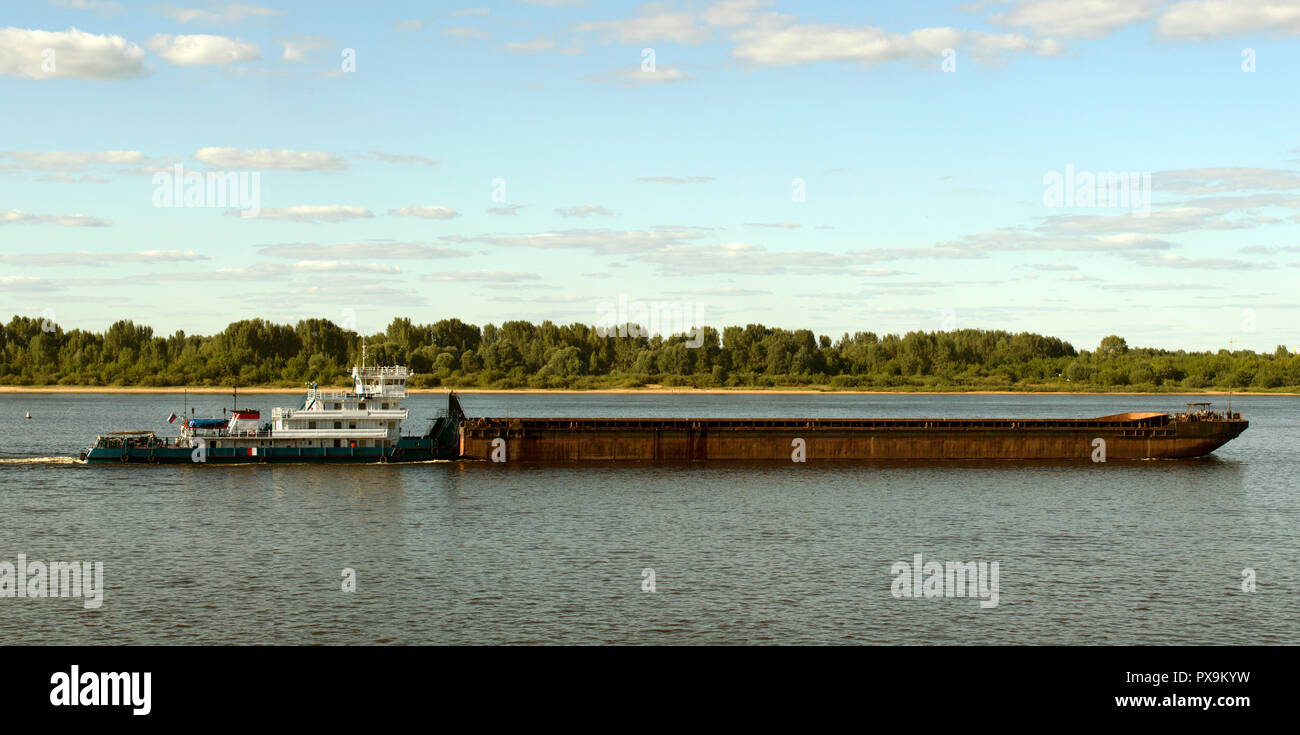NIZHNY NOVGOROD, RUSSIA - JULY 02, 2016: River transport on the river Volga. The barges, pleasure boats, top view from a height 25 meters. Nizhny Novg Stock Photo