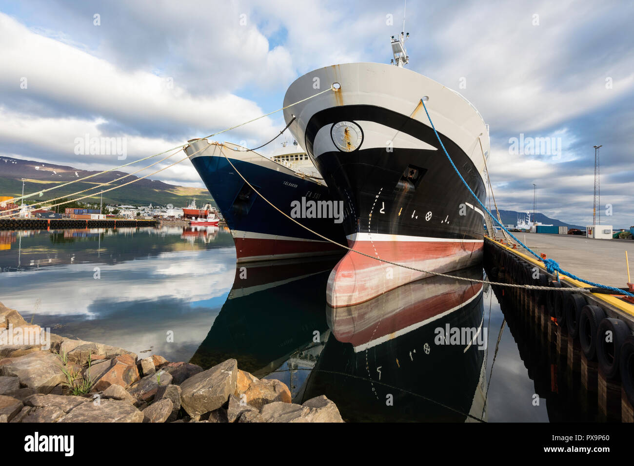 The commercial fishing and shipping harbour of Akureyri, off the north coast of Iceland. Stock Photo