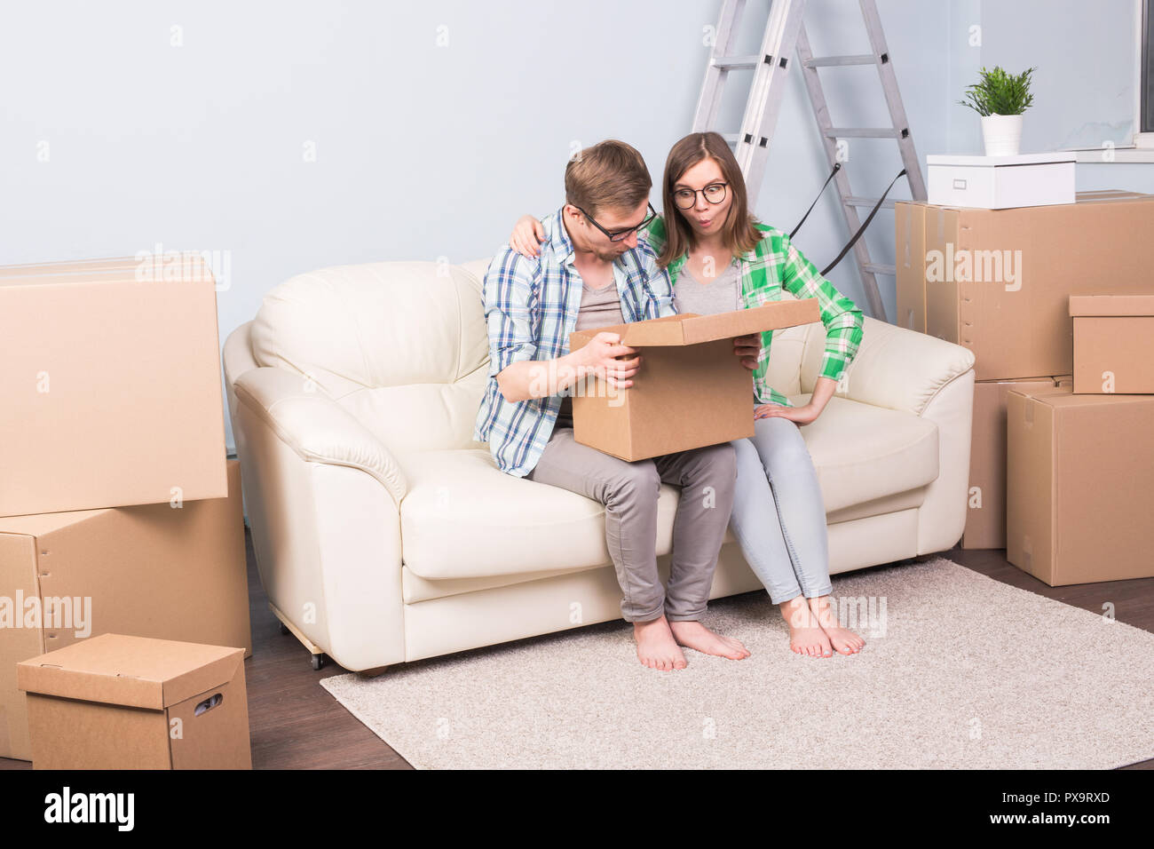 Relocation Apartment Real Estate And Moving Concept A Couple