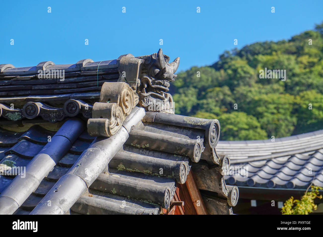 Japanese roof top with Onigawara roof tiles Stock Photo