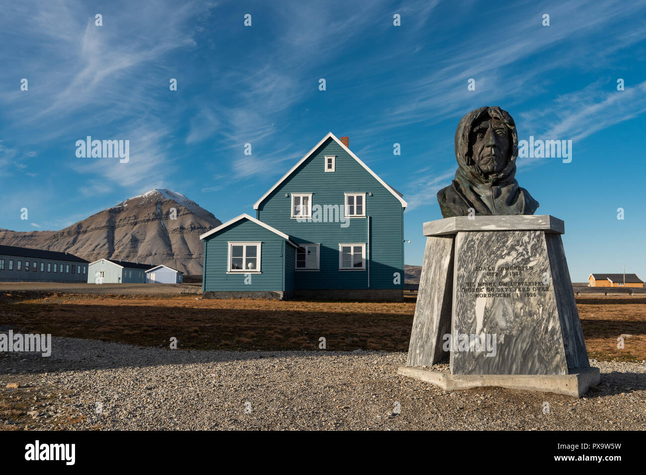 Bust of the Norwegian polar explorer Roald Amundsen in front of the German Koldewey Research Station for Arctic and Marine Stock Photo