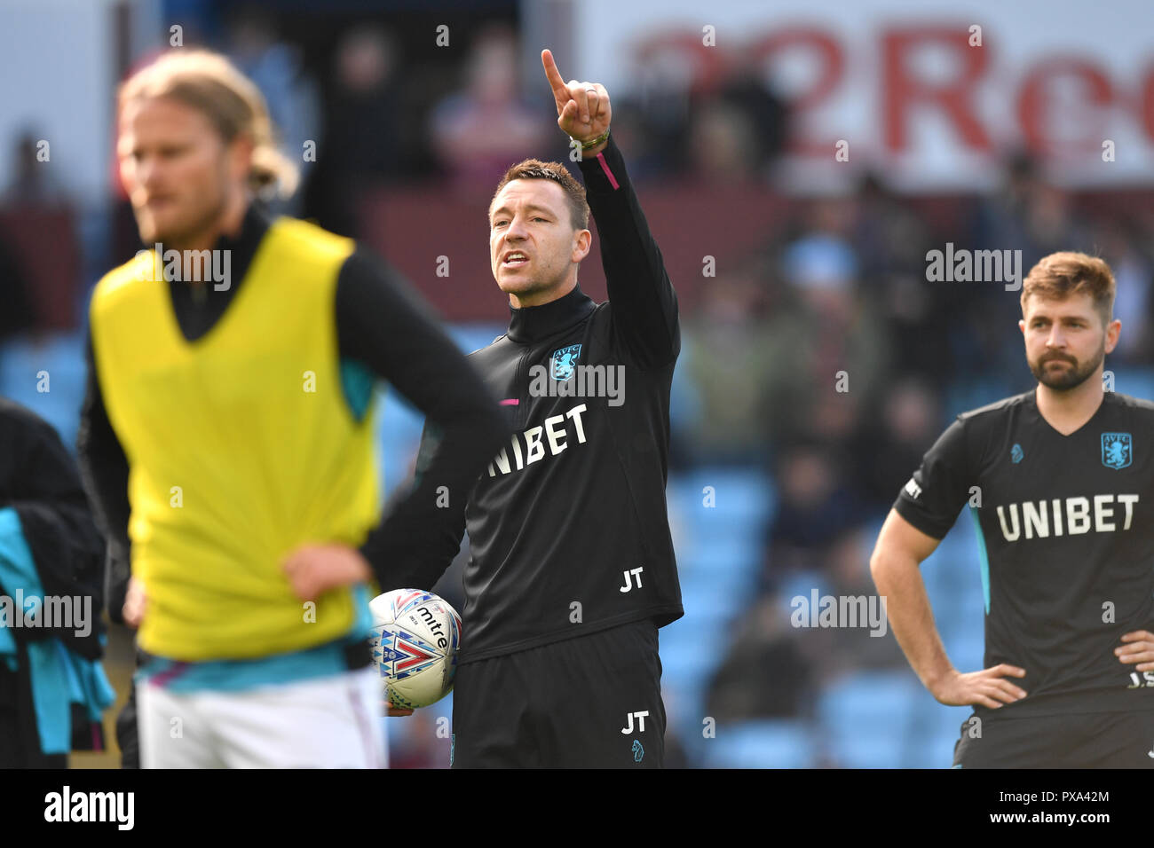 Aston Villa assistant coach John Terry during the warm-up during the Sky Bet Championship match at Villa Park, Birmingham. PRESS ASSOCIATION Photo. Picture date: Saturday October 20, 2018. See PA story SOCCER Villa. Photo credit should read: Anthony Devlin/PA Wire. RESTRICTIONS: EDITORIAL USE ONLY No use with unauthorised audio, video, data, fixture lists, club/league logos or 'live' services. Online in-match use limited to 120 images, no video emulation. No use in betting, games or single club/league/player publications. Stock Photo