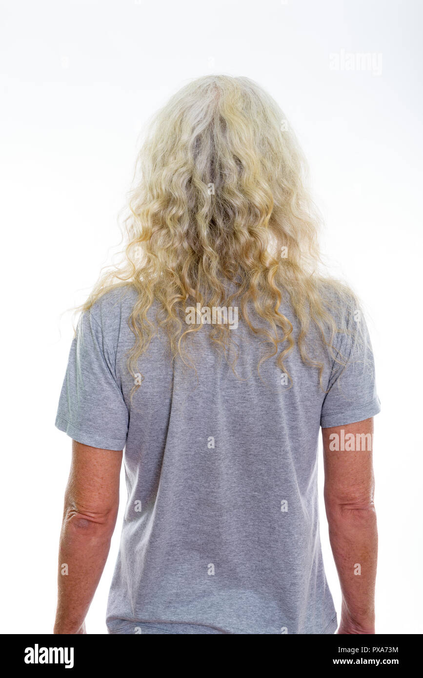 Back view of senior bearded man with long curly white hair Stock Photo