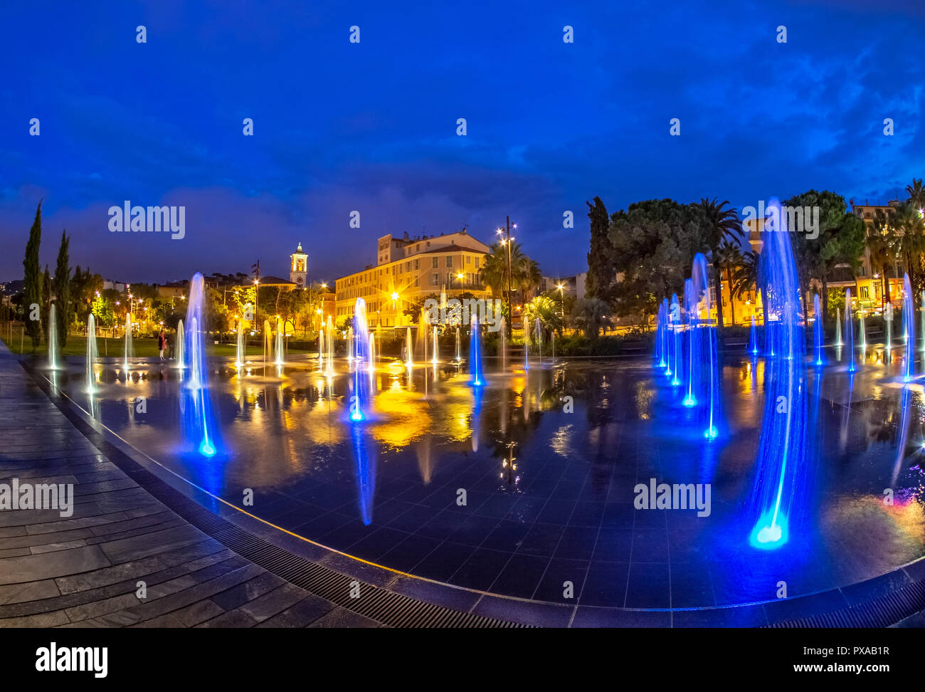 Romantic scene of the famous fountain on Place Massena in Nice, France Stock Photo