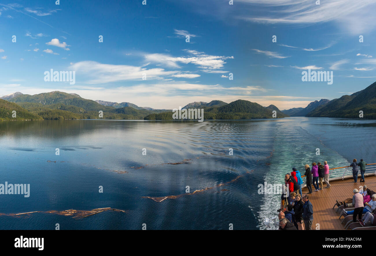 Cruise ship passengers aboard The Volendam, viewing beautiful scenery of the narrow and calm Principe Channel, part of the Inside passage route on the Stock Photo