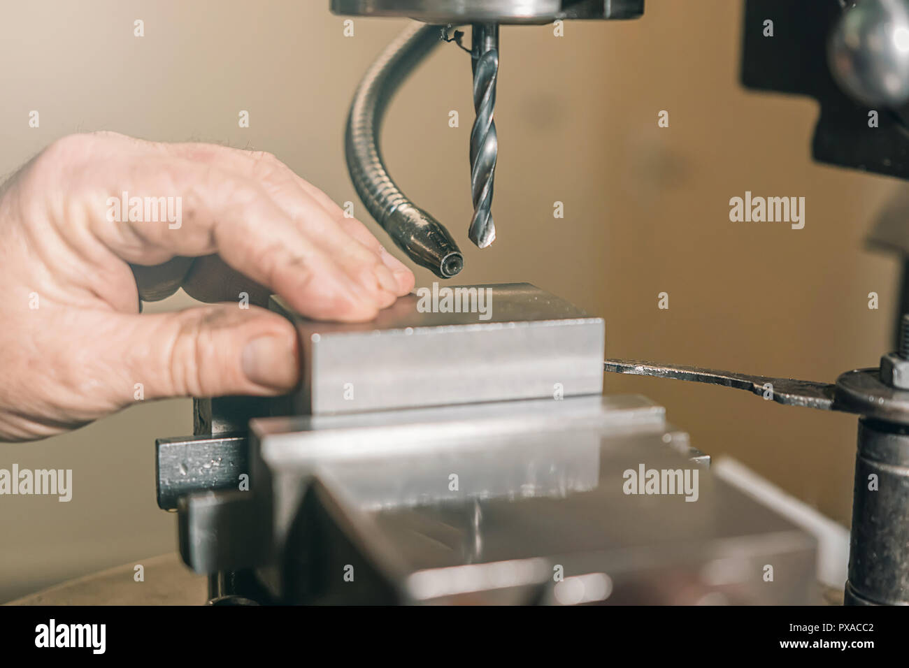 Employee drilling. Metal drilling. Metal Stock Photo Alamy